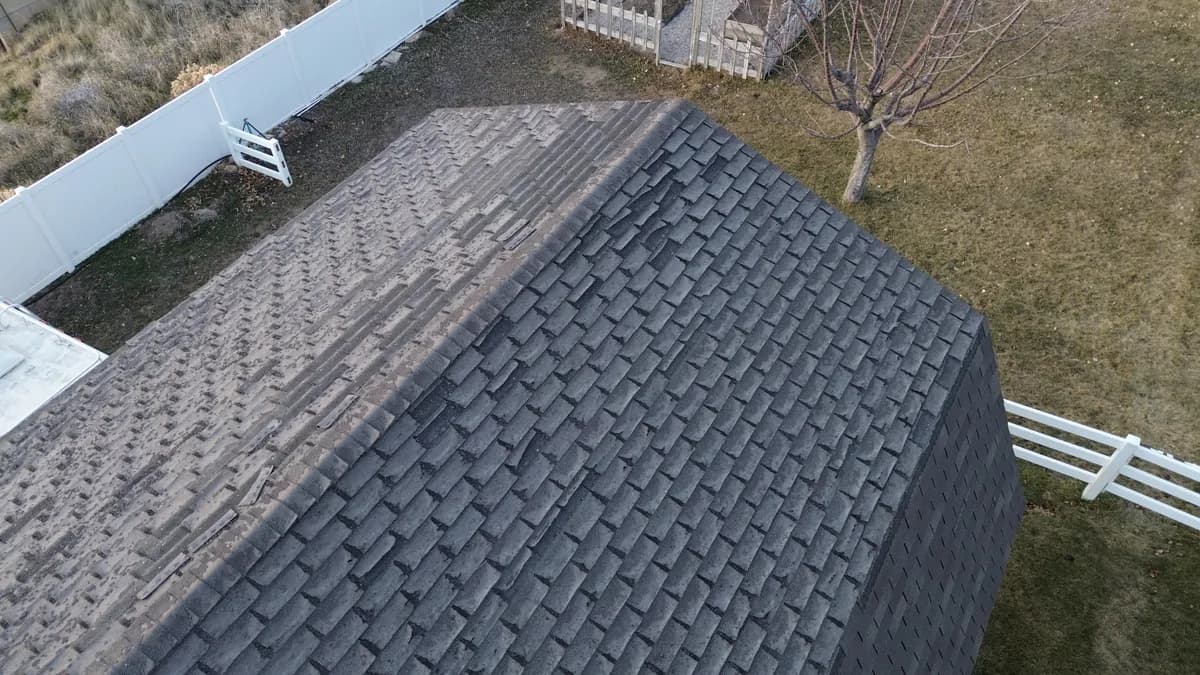 Commercial flat roof tear-off area showing moisture-related hidden condition risk