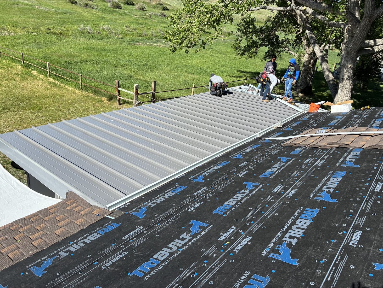 Professional installation of a TPO flat roof on a Salt Lake City commercial building