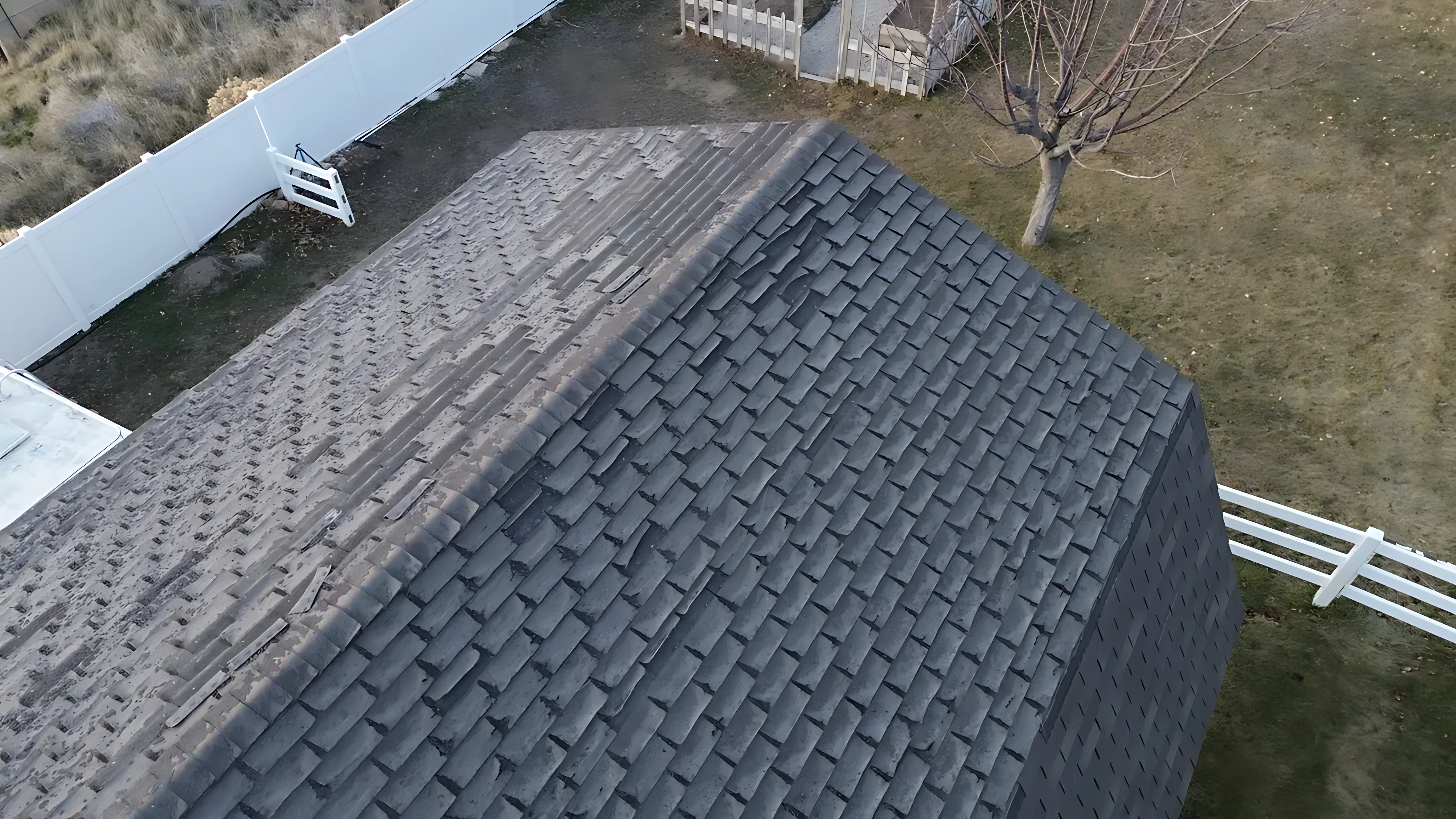 Ponding water on a low-slope roof showing what happens when drainage design fails