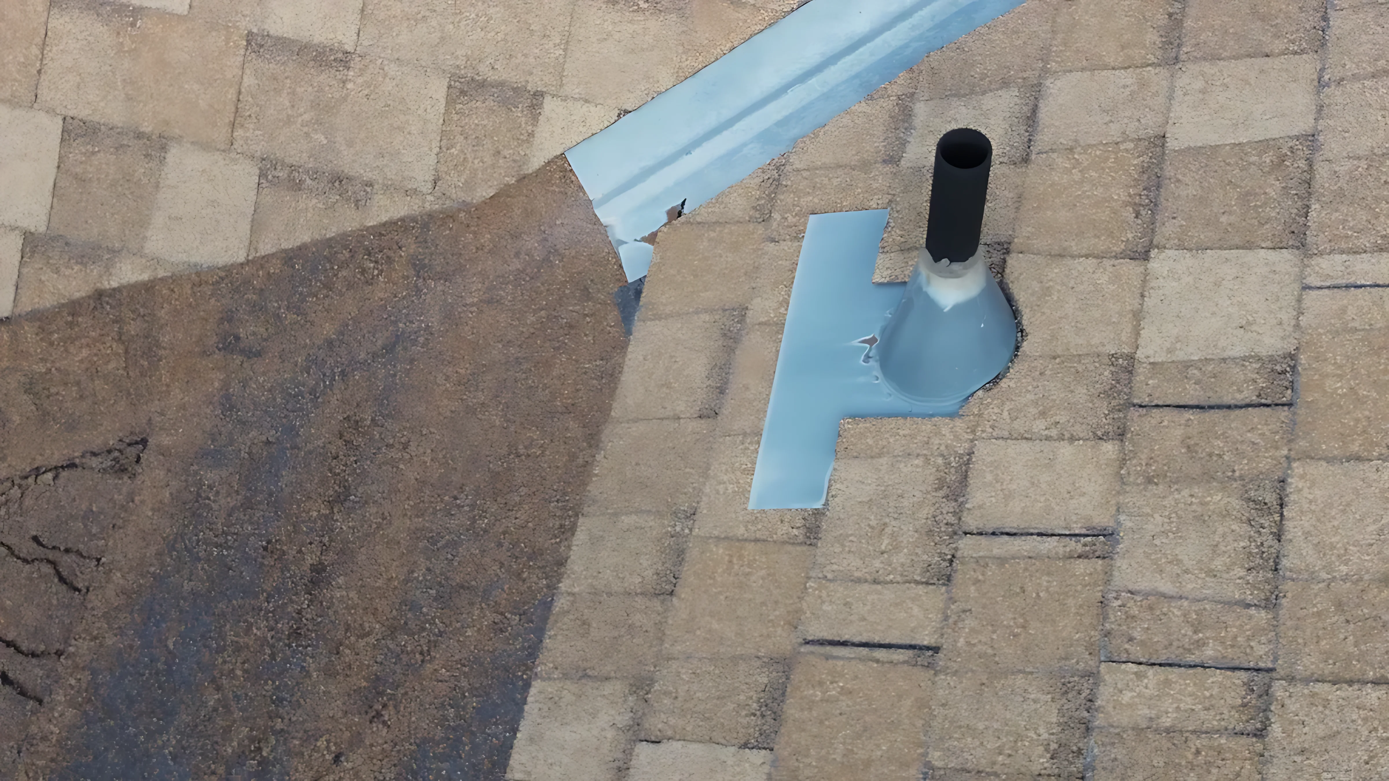 Professional roof snow removal being performed safely with specialized tools