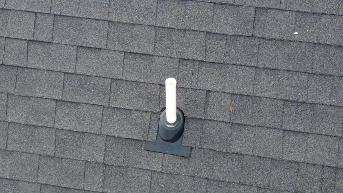 Drone footage of precision shingle repair