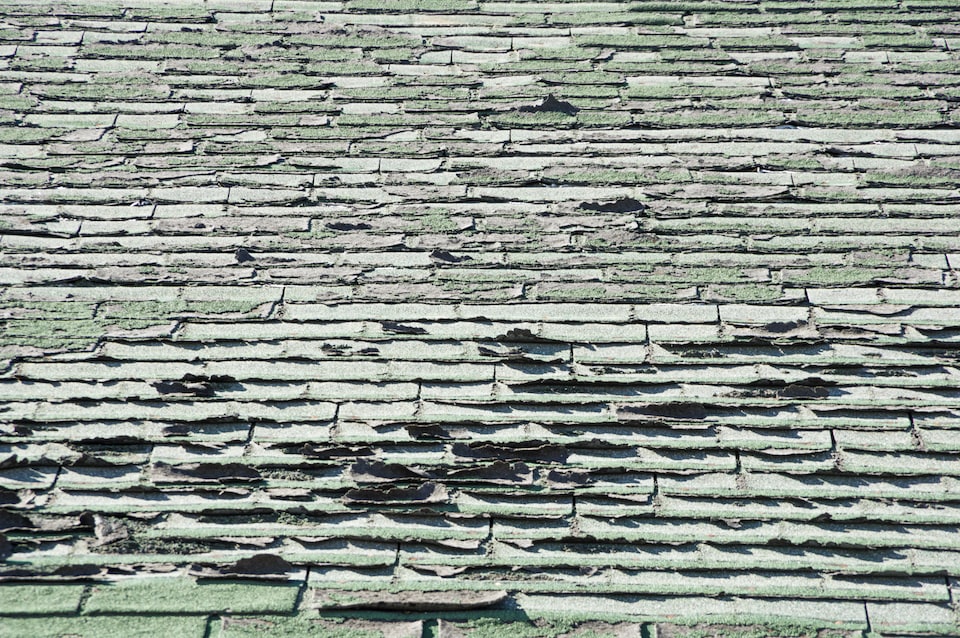 Signs of an aging asphalt shingle roof